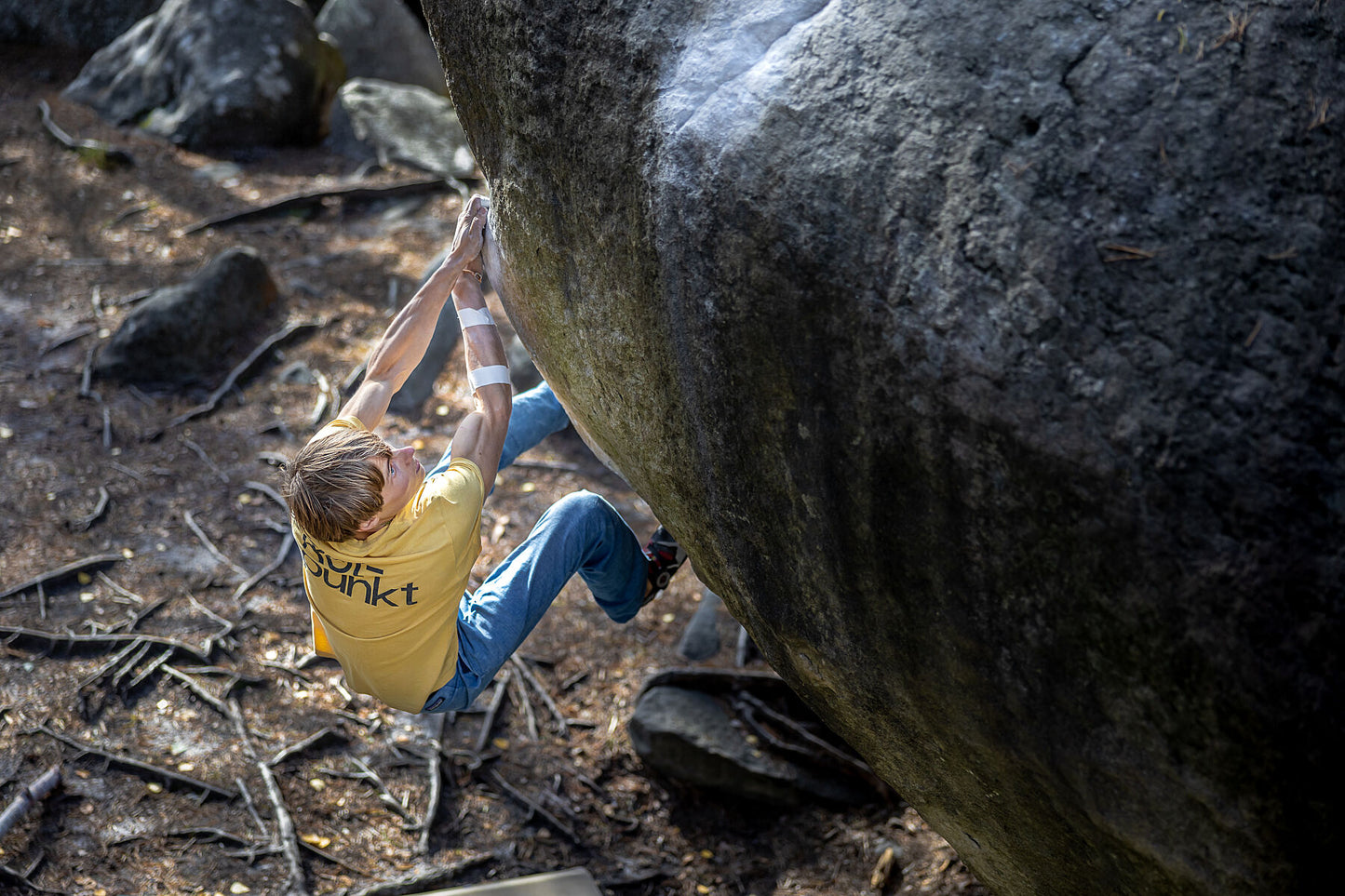 Print of Alex Megos climbing Karma 8A+ in Fontainebleau, France.