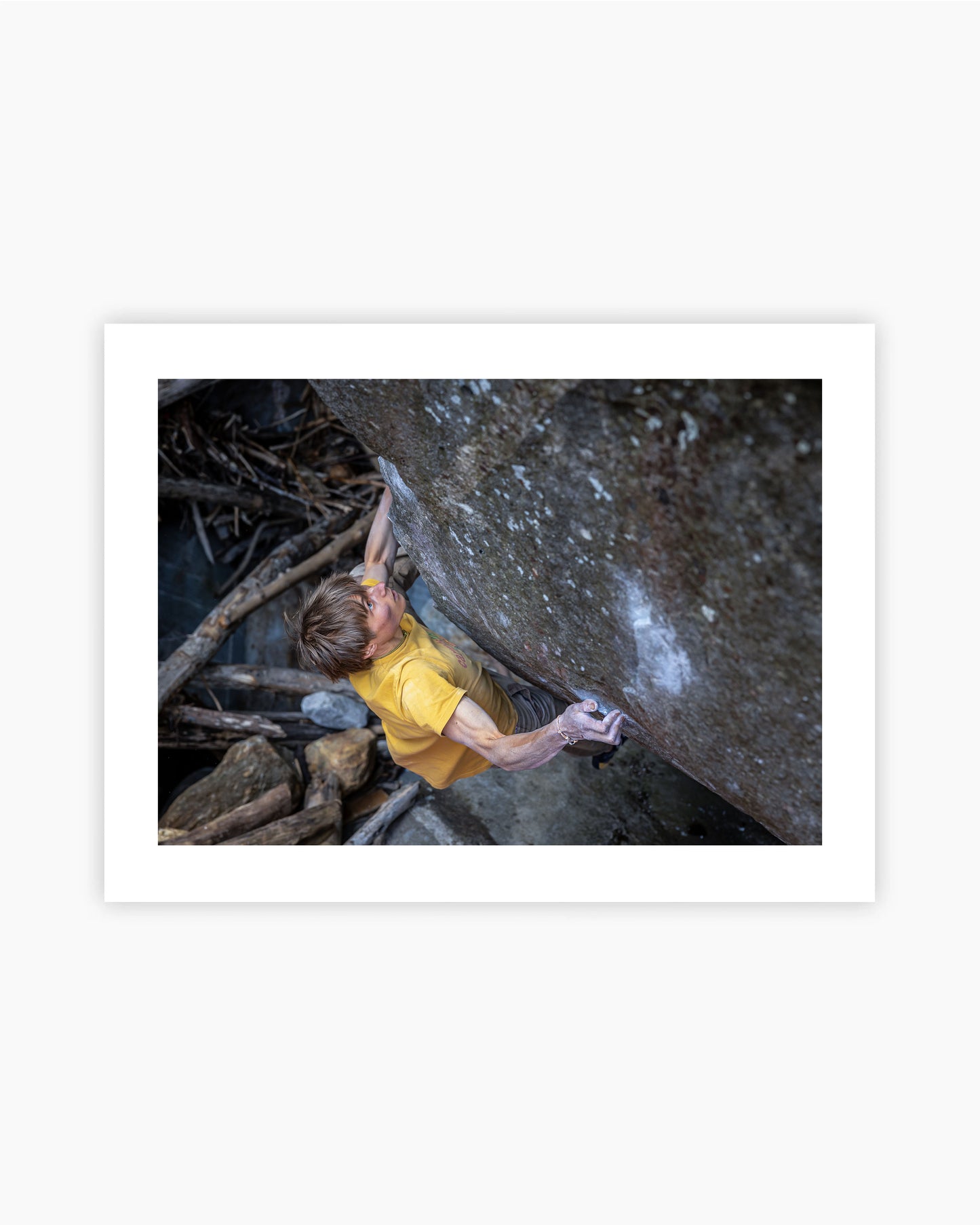 Print of Alex Megos climbing Casavino 8B+ in Brione, Switzerland.