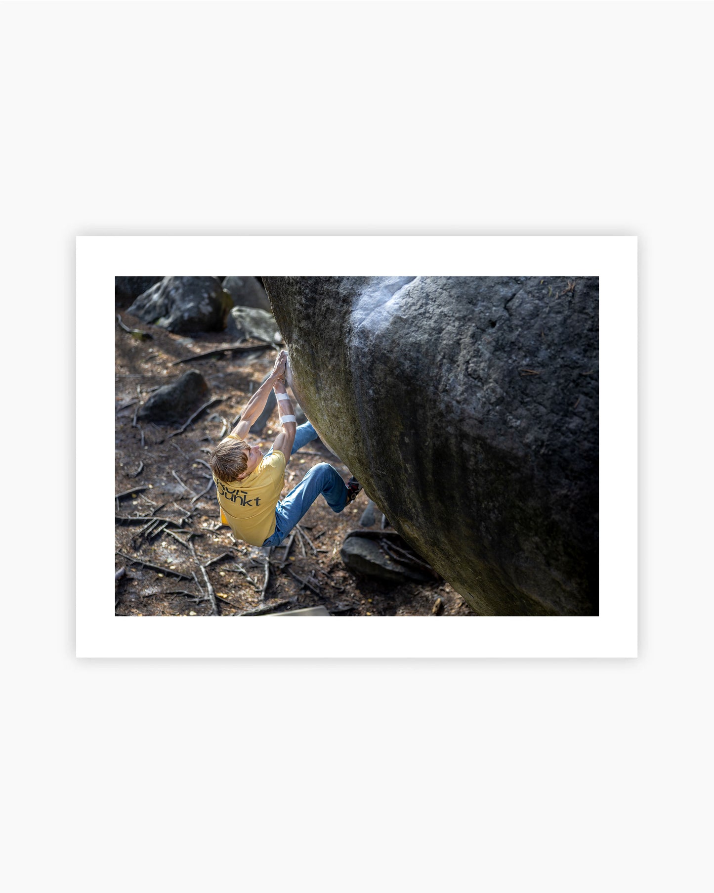 Print of Alex Megos climbing Karma 8A+ in Fontainebleau, France.
