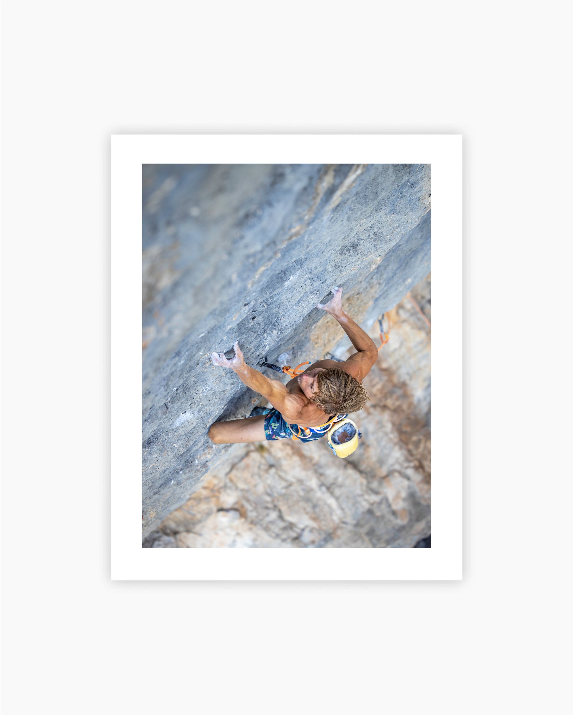 Print of Alex Megos climbing Ratstaman Vibrations 9b in Céüse, France, 2022.