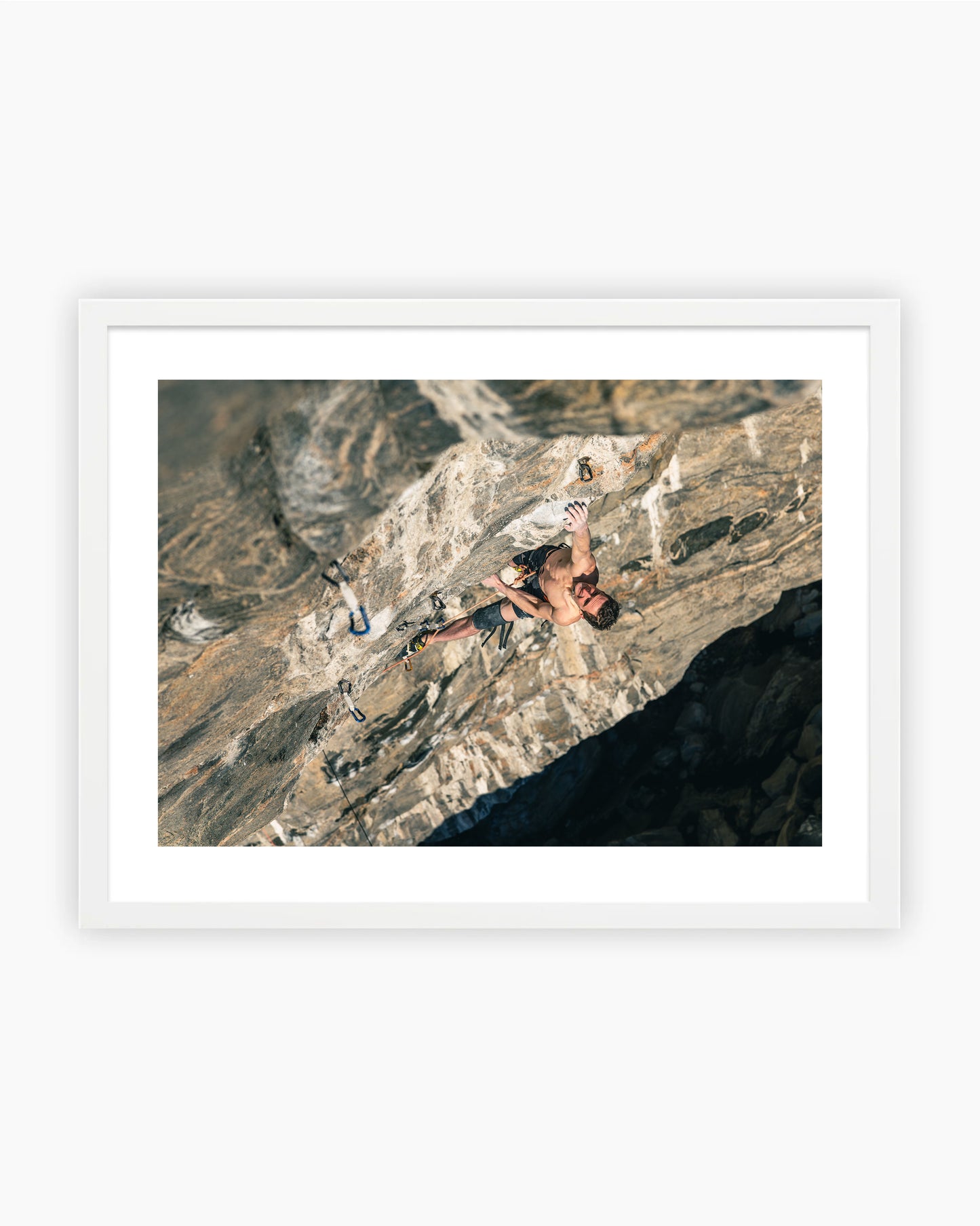 Framed print of Adam Ondra climbing Project B.I.G. in Flatanger, Norway.
