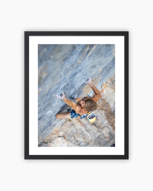 Framed print of Alex Megos climbing Ratstaman Vibrations 9b in Céüse, France, 2022.