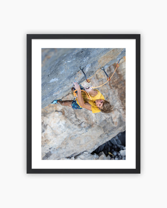Framed print of Alex Megos climbing Ratstaman Vibrations 9b. Céüse, France 2022.