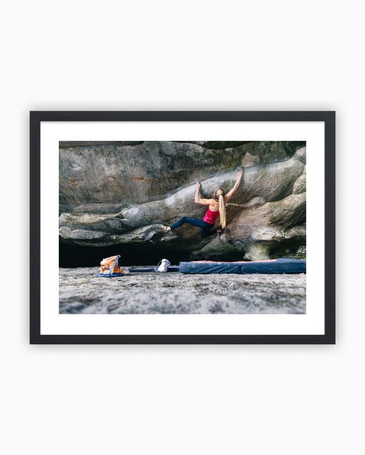 Framed print of Hannah Meul climbing Atomic Playboy boulder. Fontainebleau, France 2021.