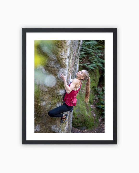 Framed print of Hannah Meul climbing Partage boulder. Fontainebleau, France 2021.