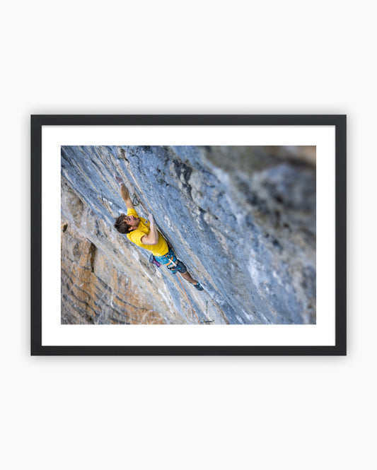 Framed print of Hugo Parmentier climbing Hyper Finale 9a+ in Rawyl, Switzerland.