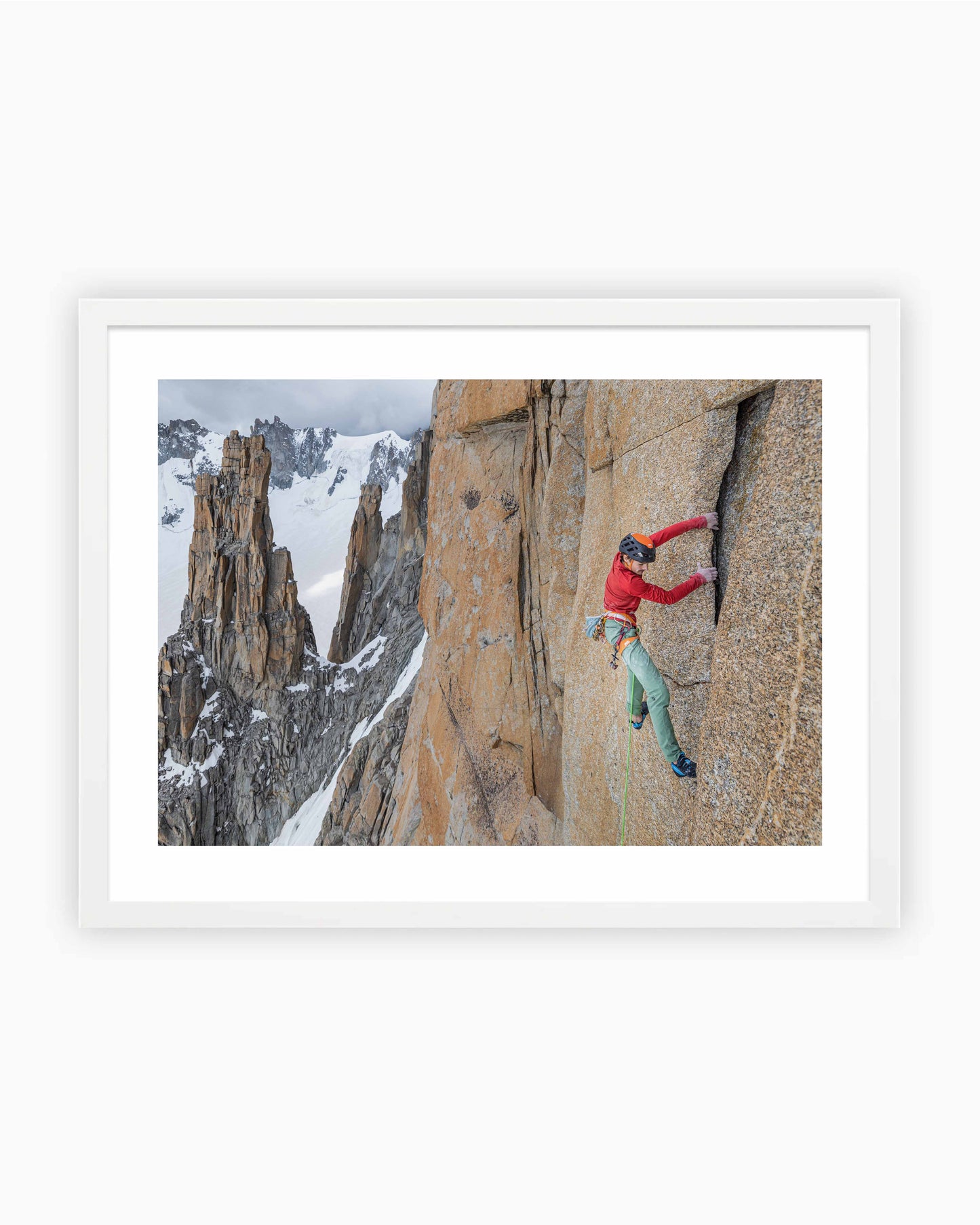 Framed print of Hugo Parmentier climbing Voie Petit on Grand Capucin in Chamonix, France.