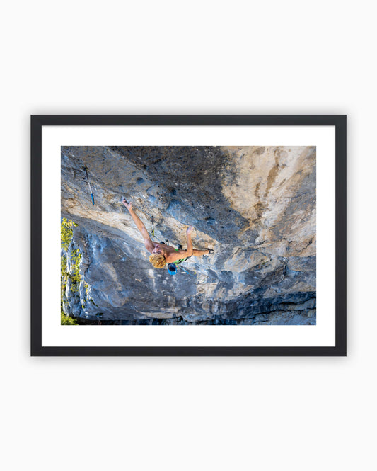Framed print of Mejdi Schalck climbing Bio Sharma Graphie 9a in Rocher de Bevreau, France.