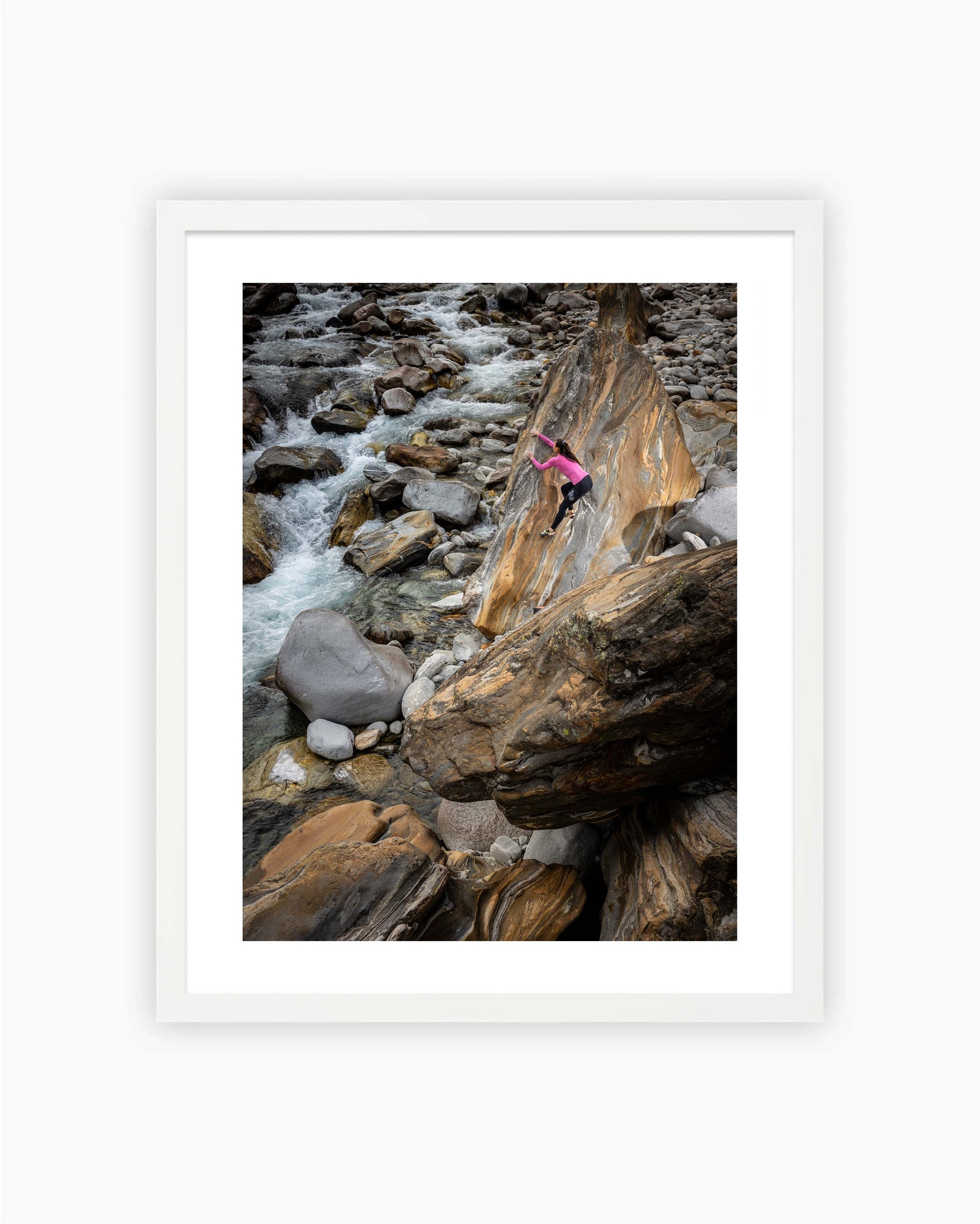 Framed print of Rose climbing Riverside boulder. Brione, Ticino, Switzerland 2021.