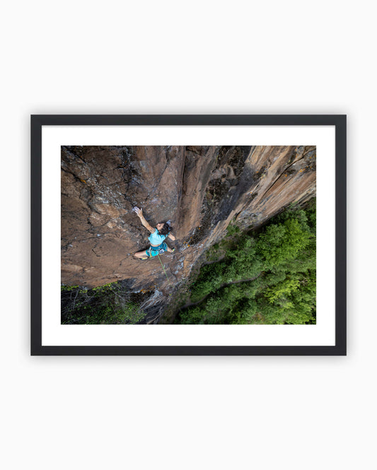 Framed print of Sarah climbing in Pradel, France.
