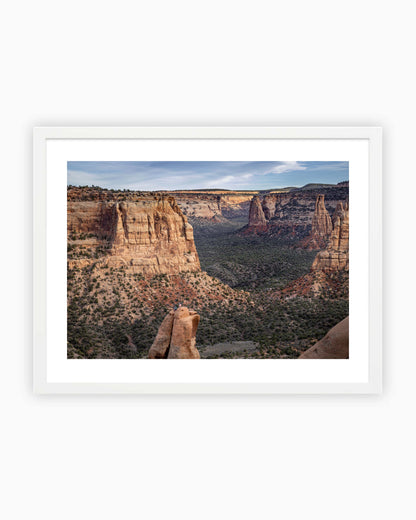 Framed print of climbers on the summit of Sentinel Spire. Colorado National Monument, USA.