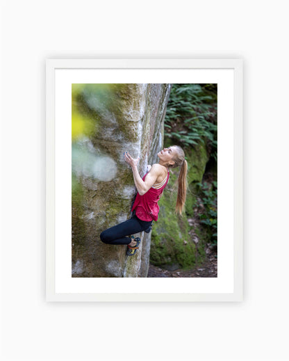 Framed print of Hannah Meul climbing Partage boulder. Fontainebleau, France 2021.