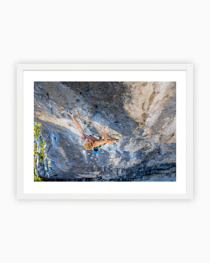 Framed print of Mejdi Schalck climbing Bio Sharma Graphie 9a in Rocher de Bevreau, France.